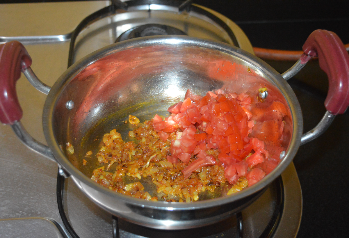 Throw in chopped tomatoes.