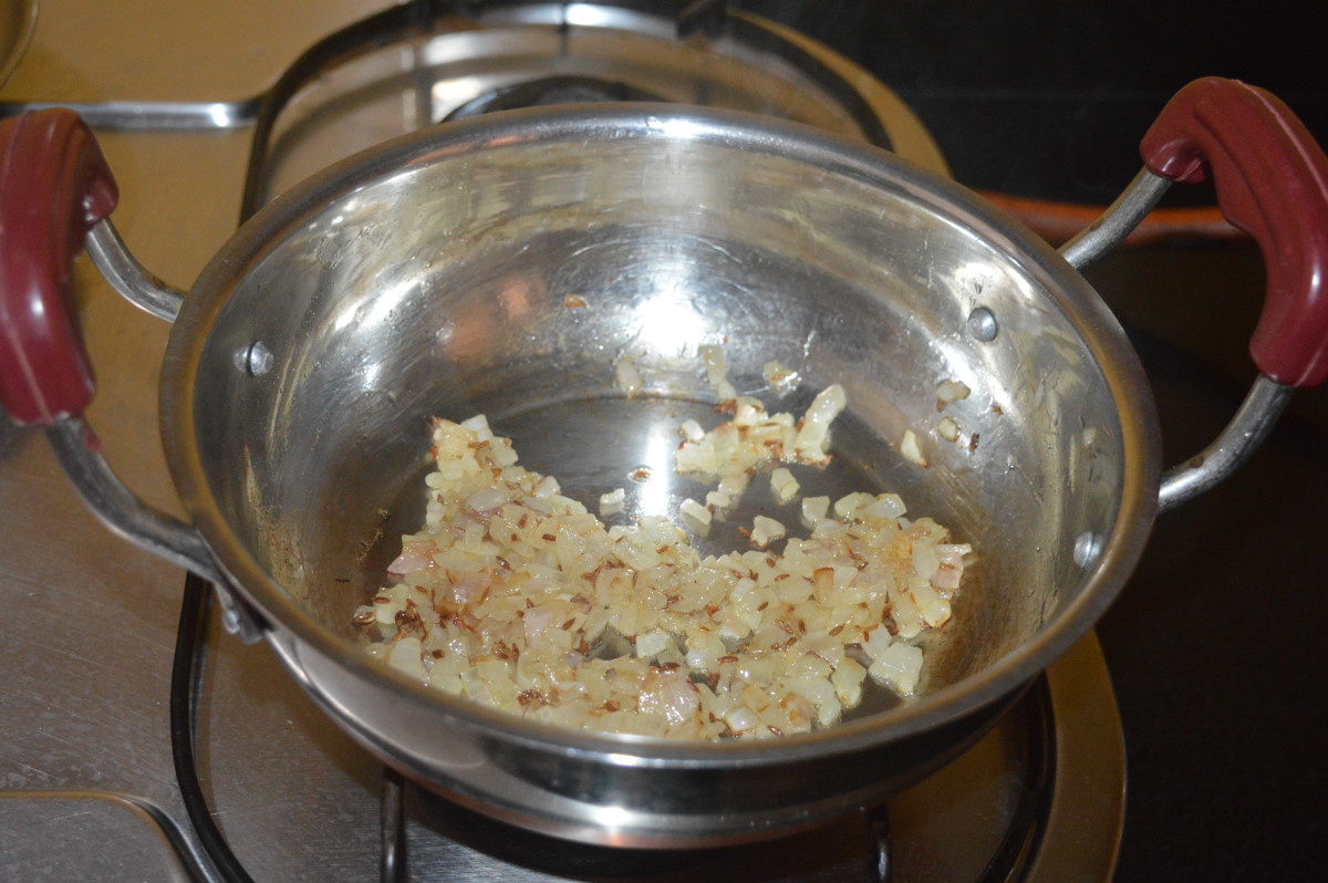 Throw in chopped onions. Saute until they become transparent.