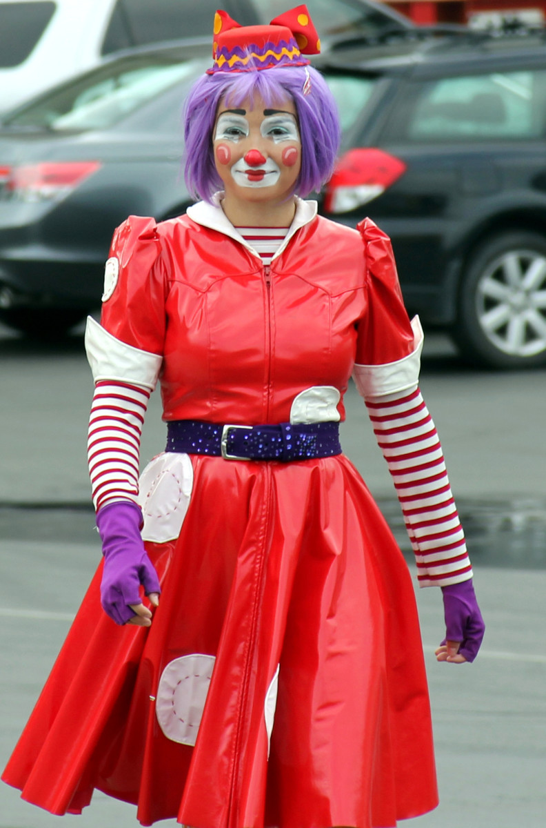 A Ringling Brothers Clown. She may have graduated from their Clown College.. 