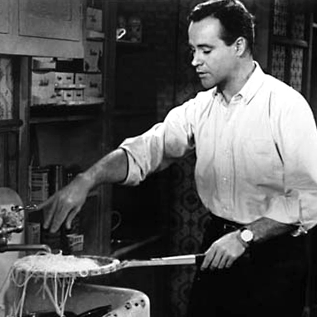 The famous spaghetti straining scene in which C.C Baxter the batchelor improvises with a tennis racquet as a culinary utensil.