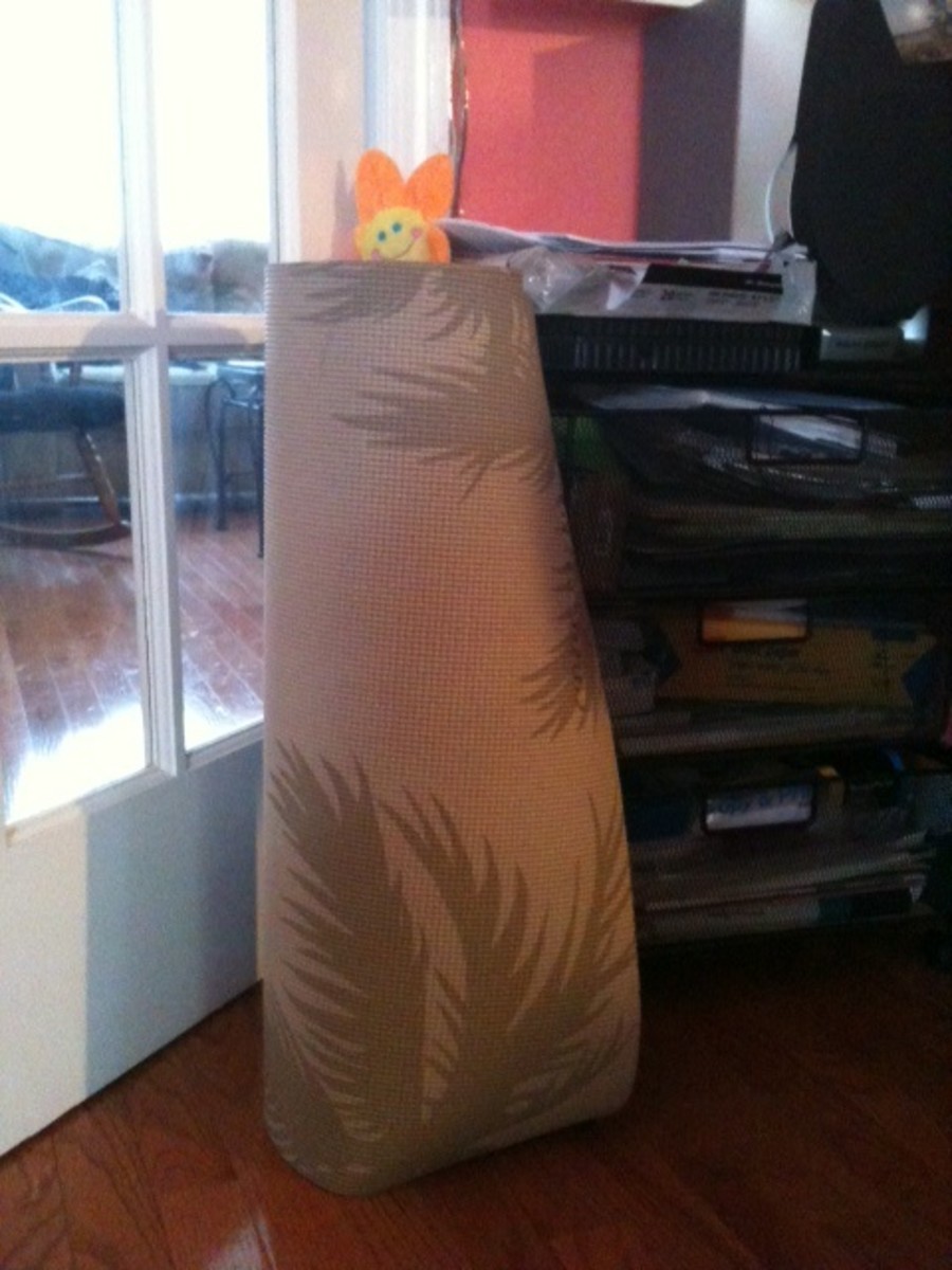 The yoga mat sits handy in the corner of the office.