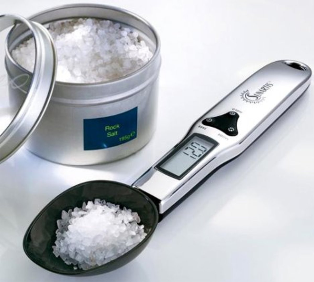 This modern spoon/scale measures volume vs weight in the blink of an eye. It offers a LCD viewing screen built into the handle. This one runs about $24 at ThinkGeek.com