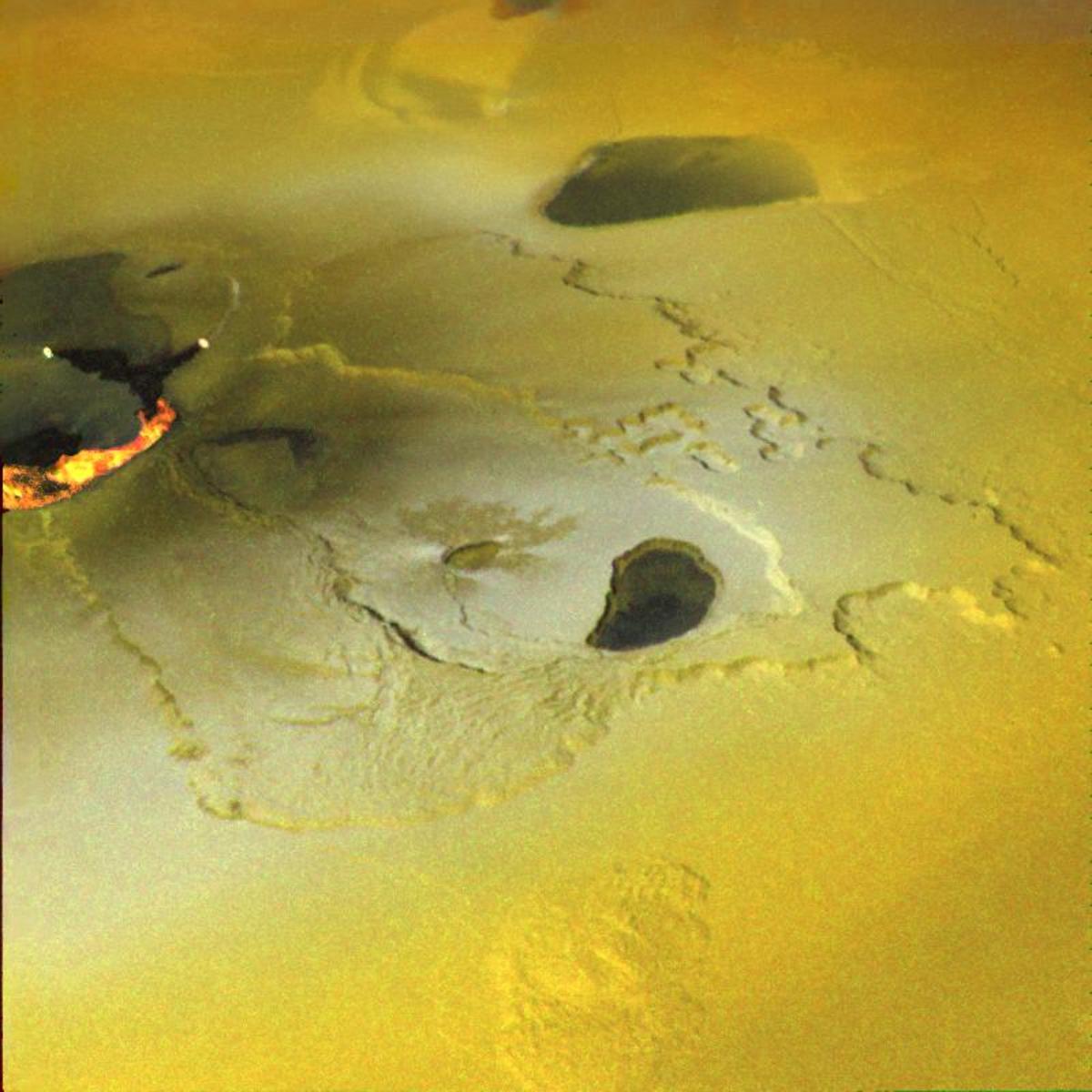 A volcanic eruption on Io, and the sulphur coated surface of an utterly inhospitable world