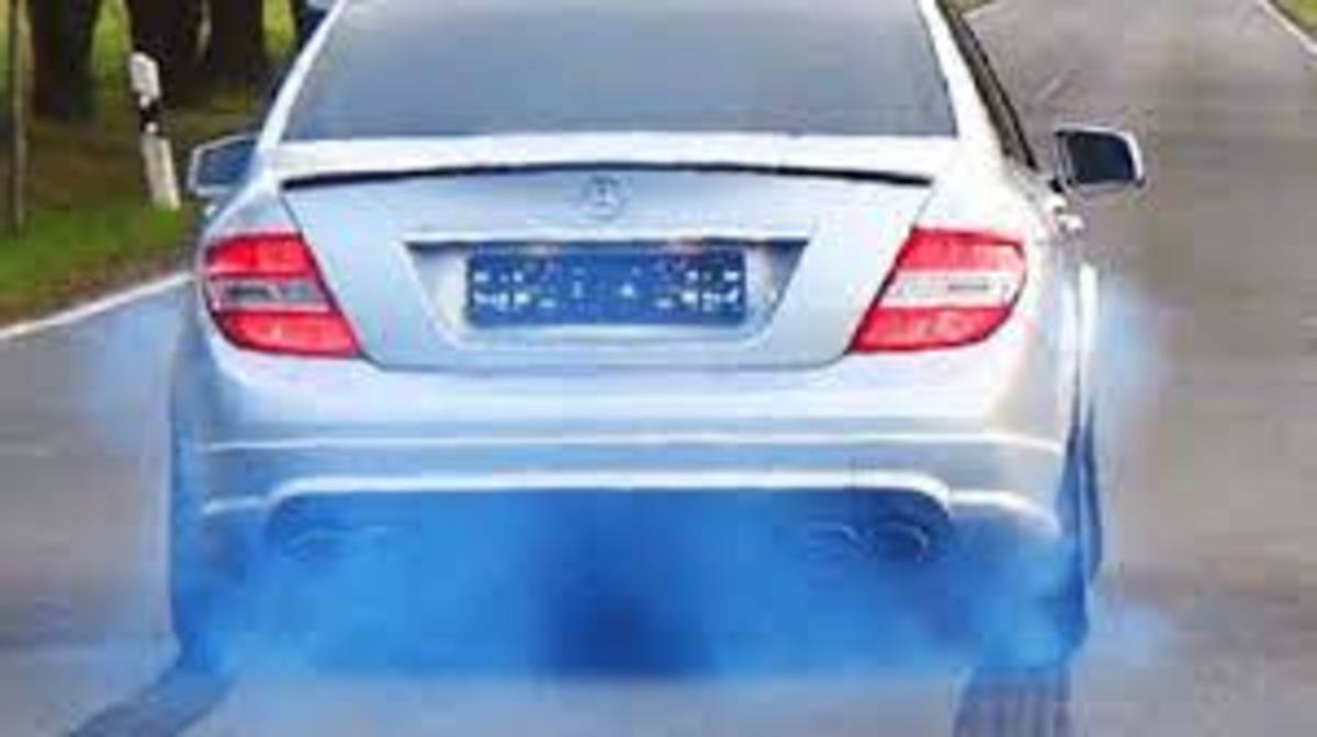 Consider the color of the smoke coming out of the exhaust.
