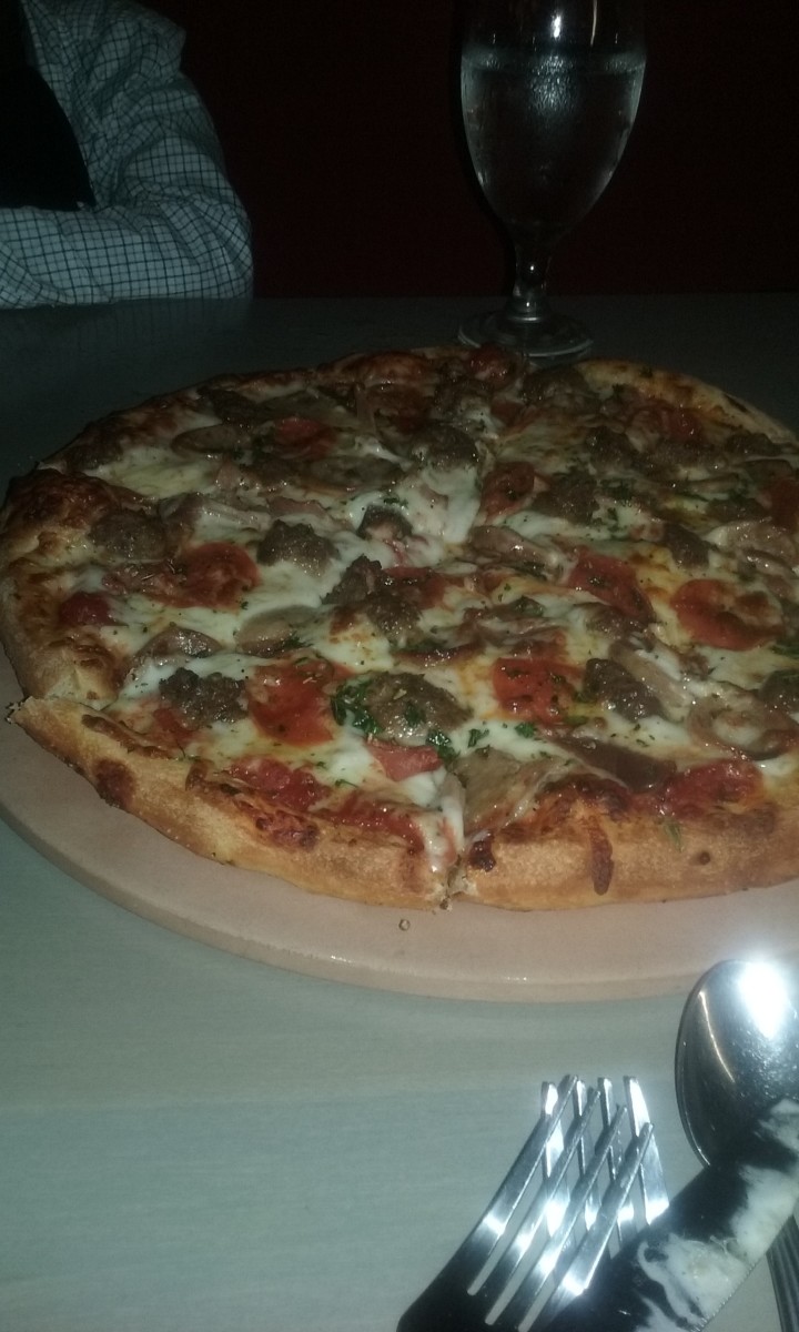 Meat lover's pizza at Giovanni's Italian Restaurant in Greensboro, North Carolina