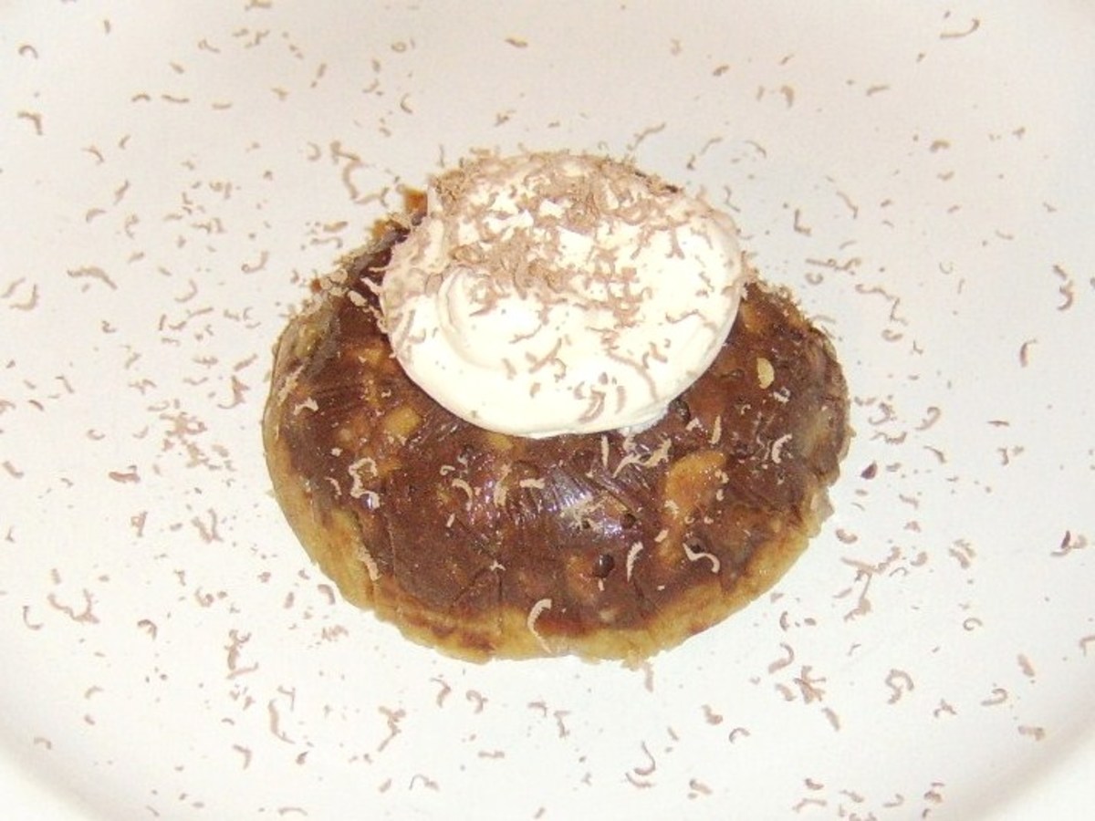 Set chocolate and apple on a Scottish shortbread biscuit with freshly whipped cream