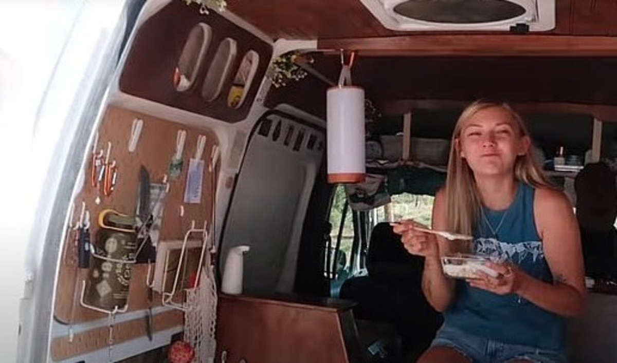 Gabby Petito eating a snack in the back of her travel van. Photo courtesy of YouTube.