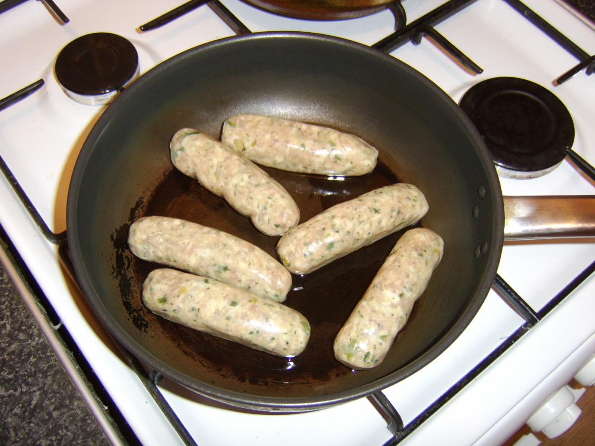 Pan fry the sausages slowly, in a little oil, over a very low heat