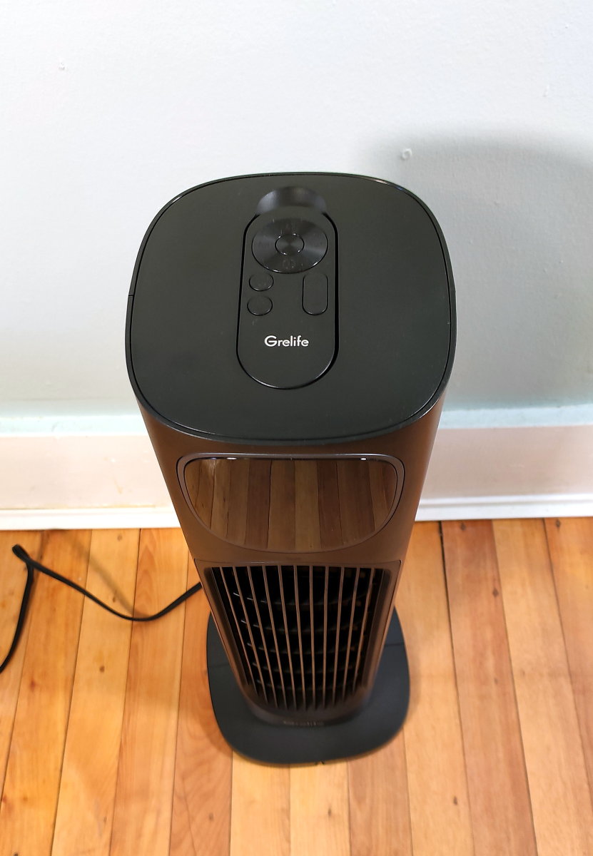 The Grelife 24-Inch Oscillating Space Heater's remote storage is located at the top.