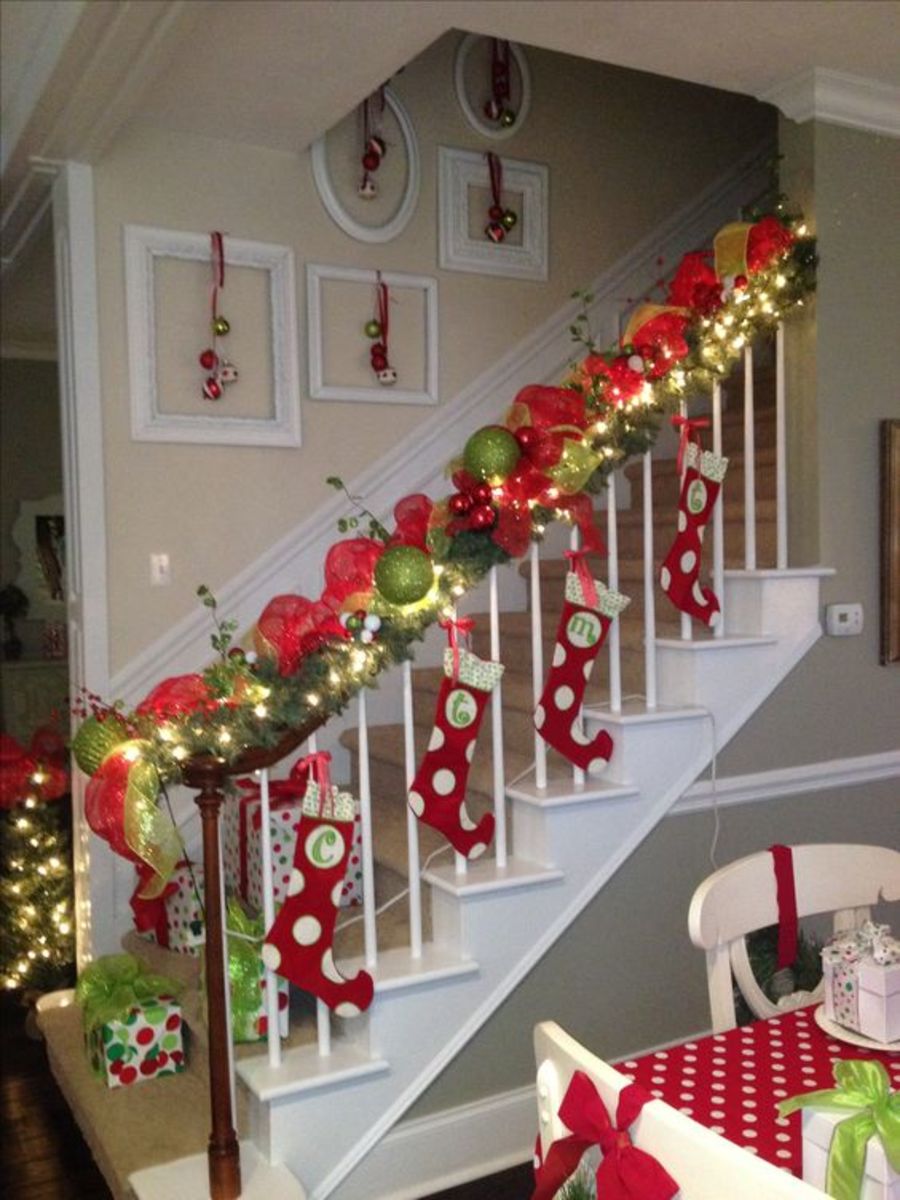 Tie stocking's to railings with ribbon. Hang ornaments on antique picture frames