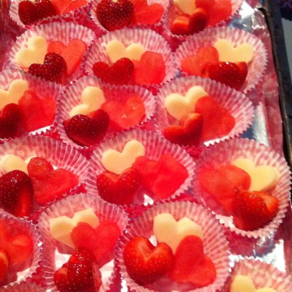 Heart shaped mozzarella, watermelon and strawberries.