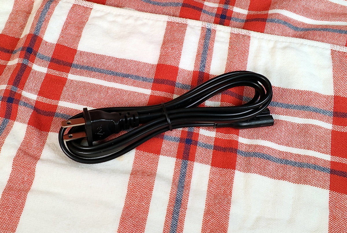 Power cable.  This device does not require an AC adapter