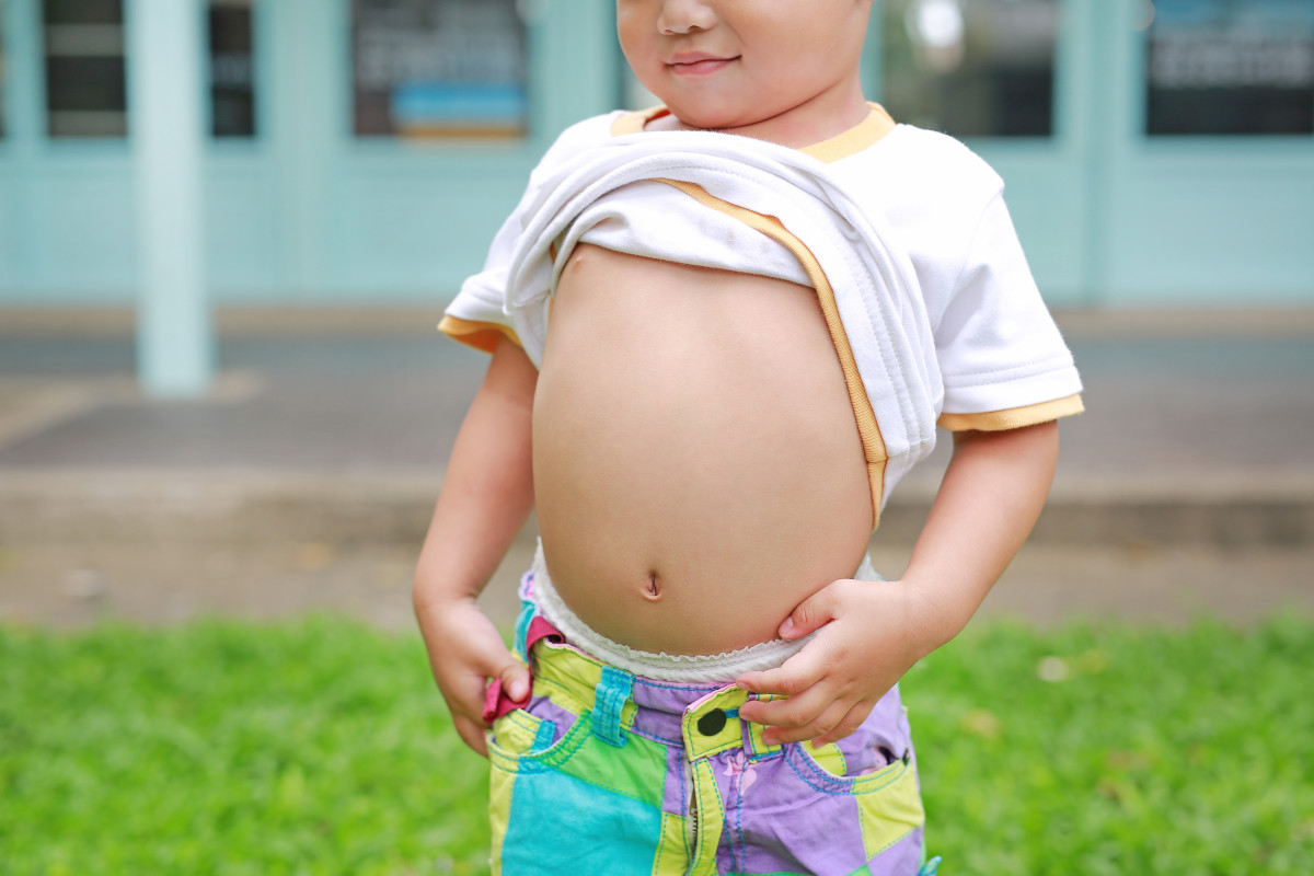 Mom Enthusiastically Shows Off Full Belly To Daughter To Teach A 