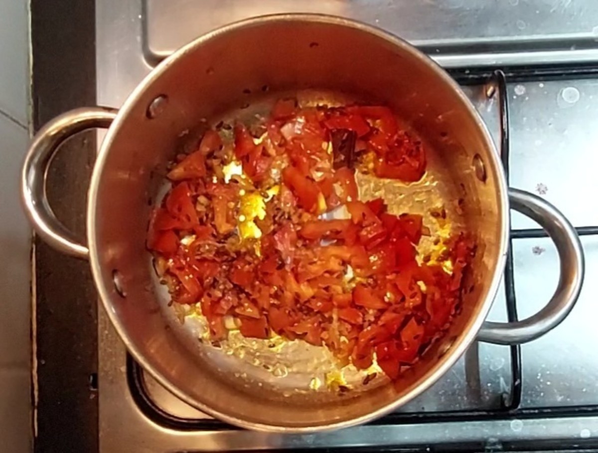 Saute well till tomato shrinks.
