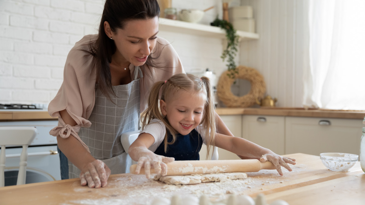 Watch Little Girl Hysterically Lose Fight Against Pizza Dough 