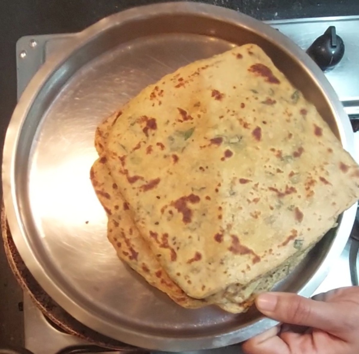 Repeat the same procedure and make more parathas using the remaining dough.