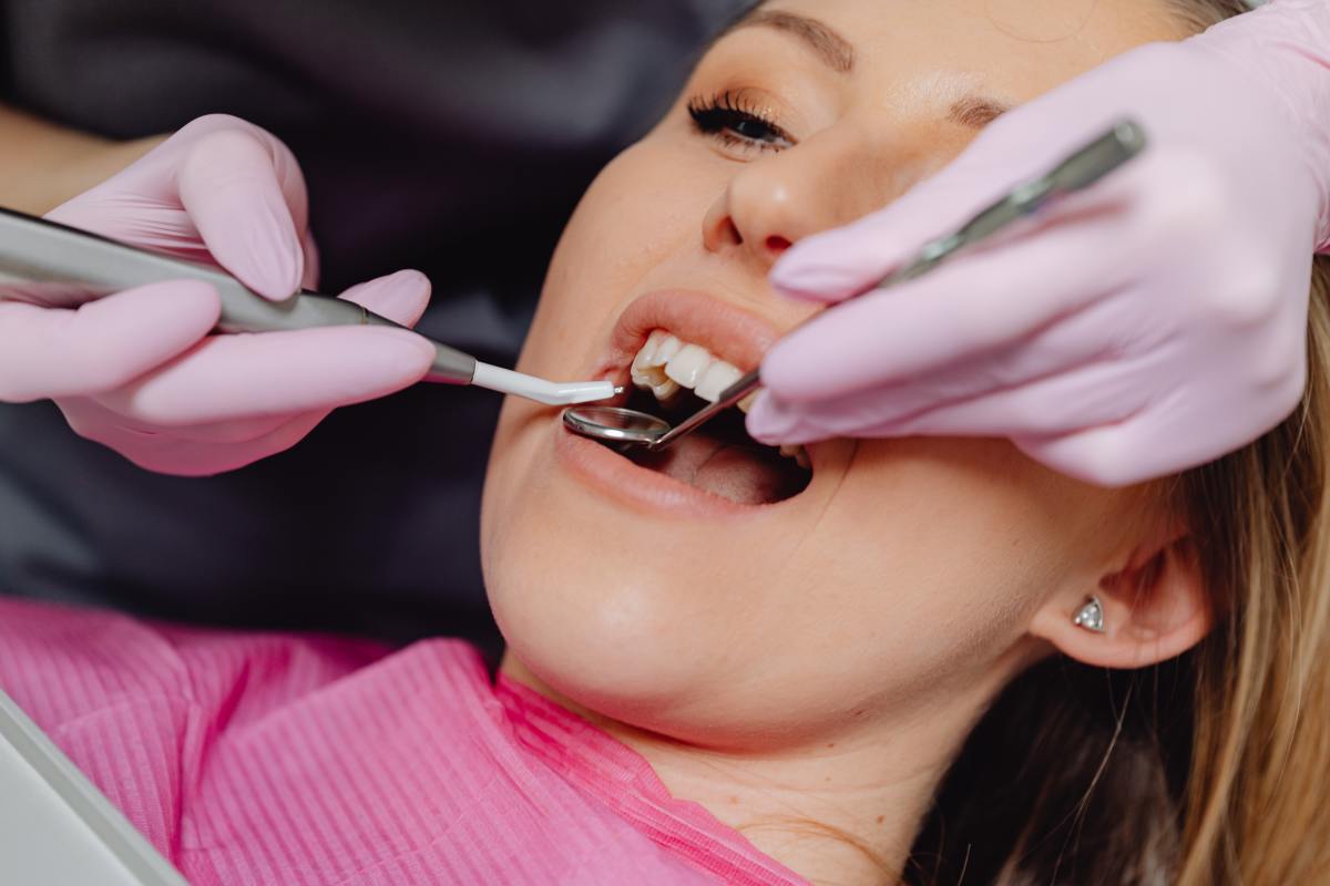 Lady getting a professional dental cleaning