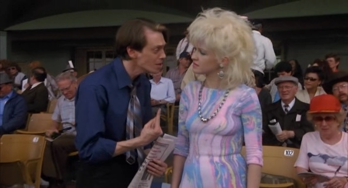 Fred asks Sylvia (Cyndi Lauper) to ask her spirit guide Louise to pick out the winning horse.so that he can pay off his debt