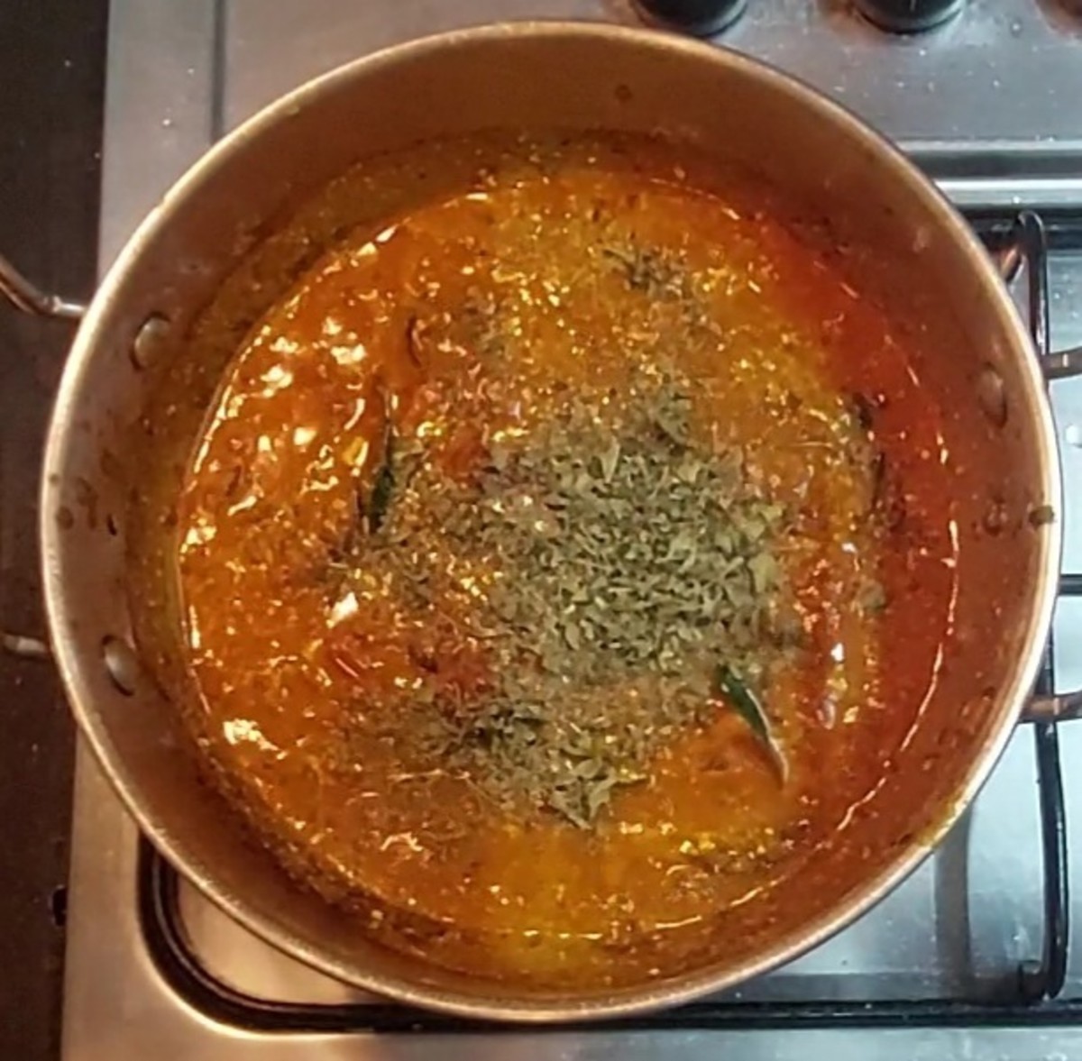Add 1 teaspoon crushed kasuri methi, mix.