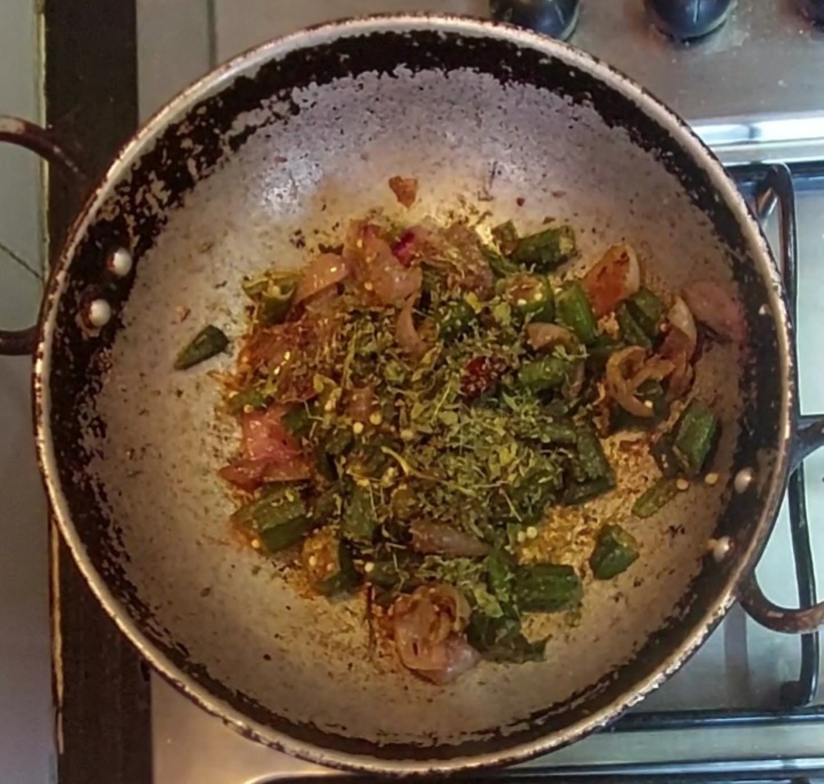 Add 1 teaspoon crushed kasuri methi, mix well and switch off the flame.