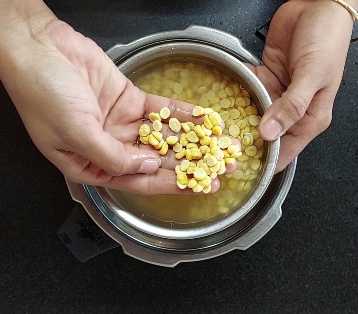 Soak 1 cup of chana dal or bengal gram for 2 hours.