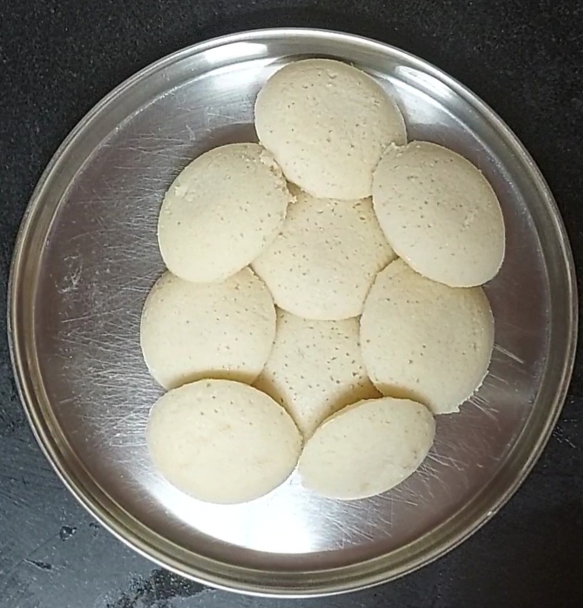 Soft and pluffy instant rava idlis are ready to serve. Serve hot with chutney or sambar and enjoy.