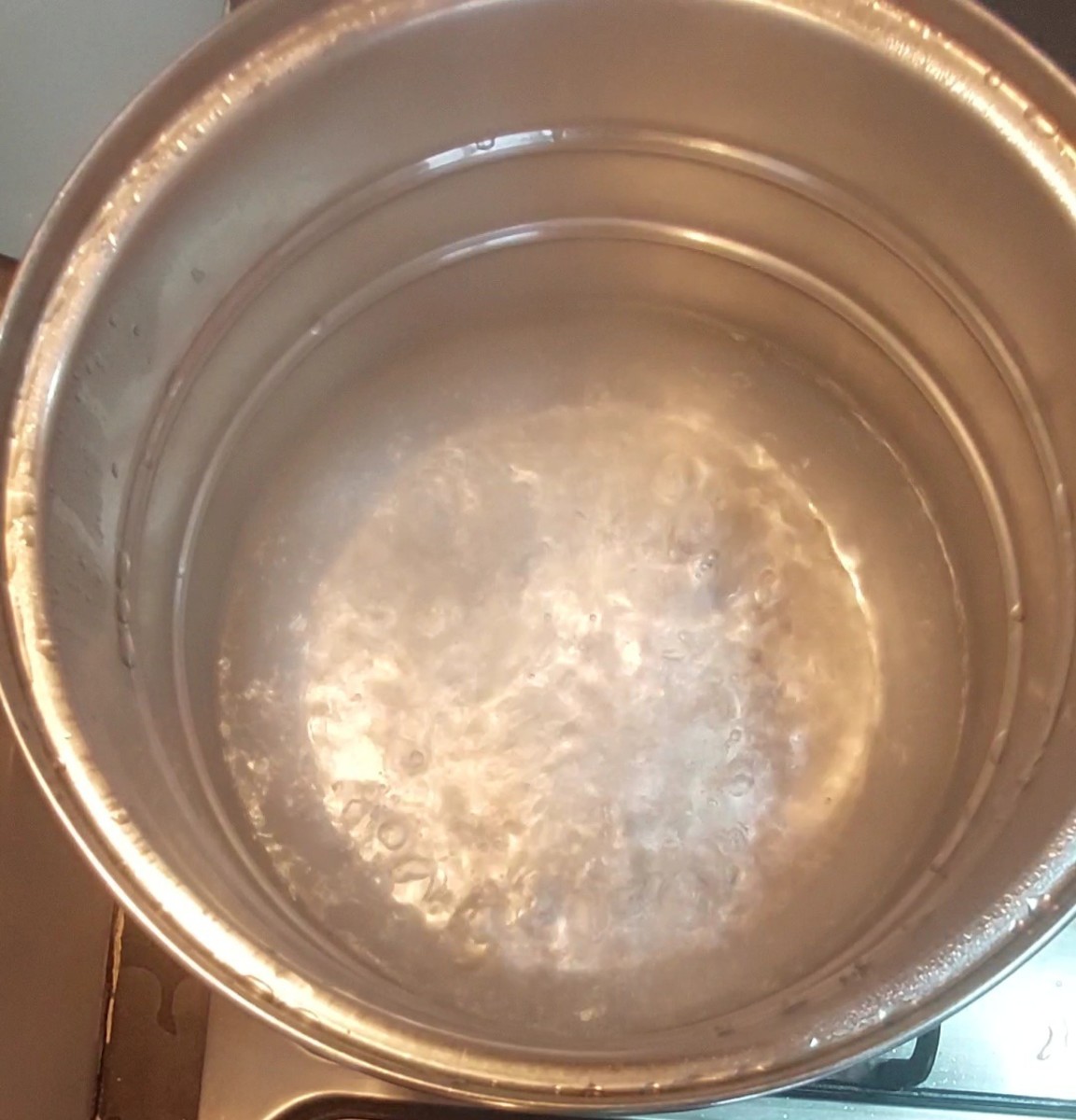 Keep water for boiling in idli steamer.