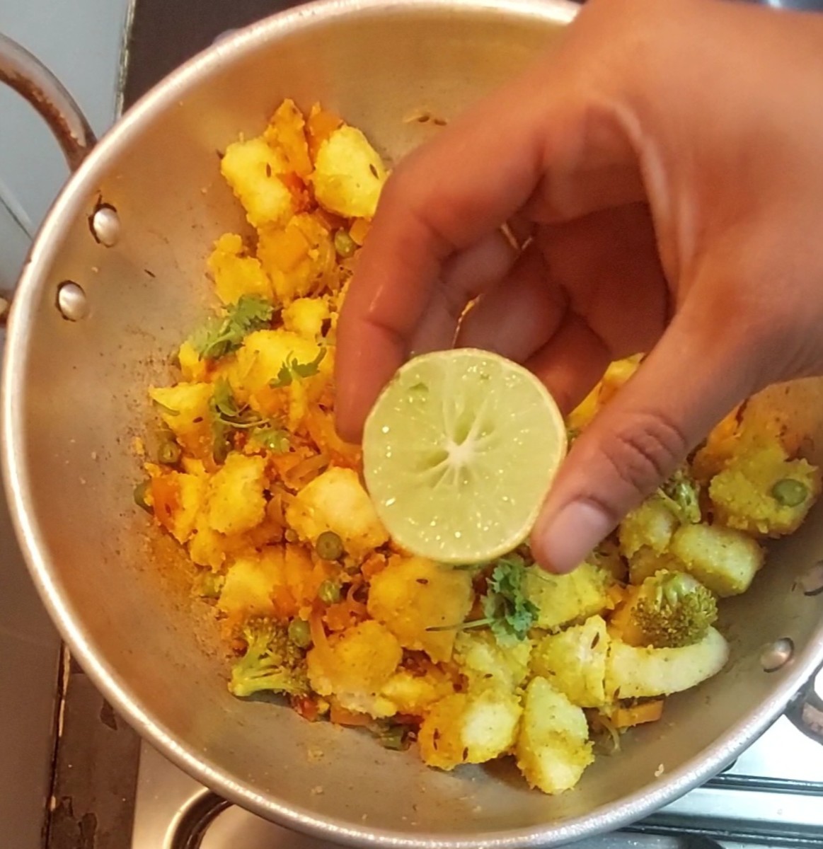 Add 2 tablespoons chopped coriander leaves, add juice of 1/2 lemon. Mix well and switch off the flame.