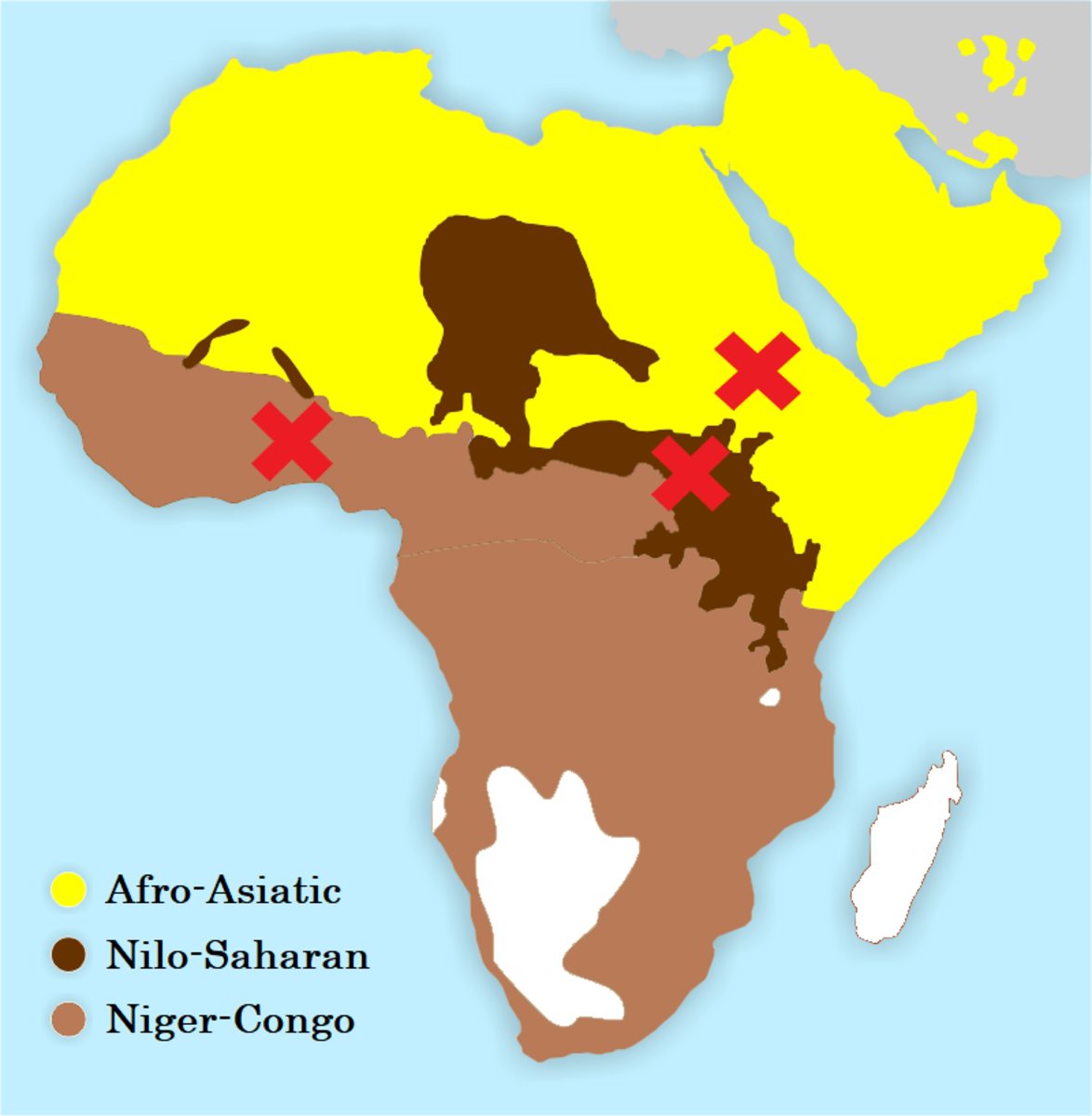 The major African language families and their possible origins (crosses). The white mainland areas contain smaller families or isolates, while Madagascar is Austric (below).