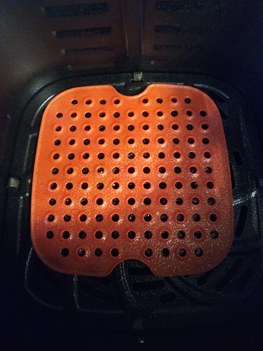 Place a silicone mat or parchment paper liner in air fryer basket. Spray generously with nonstick cooking spray.