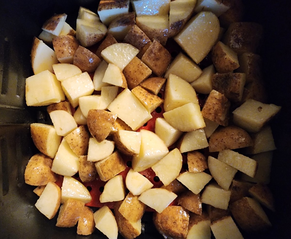 Place the potatoes in a single layer in air fryer basket. Air fry at 400 degrees for 35 minutes.