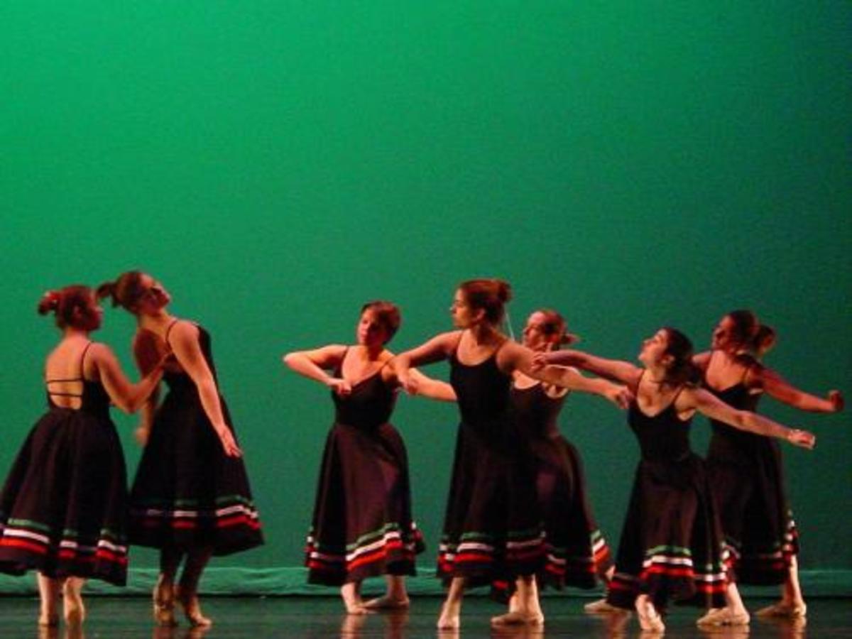 Front, far right. I was rejected from my college's audition-based company twice, but was thrilled to find one of the classes I signed up for was slated to perform an enactment of the "Tarantella" by a very talented ballet dancer/choreographer.