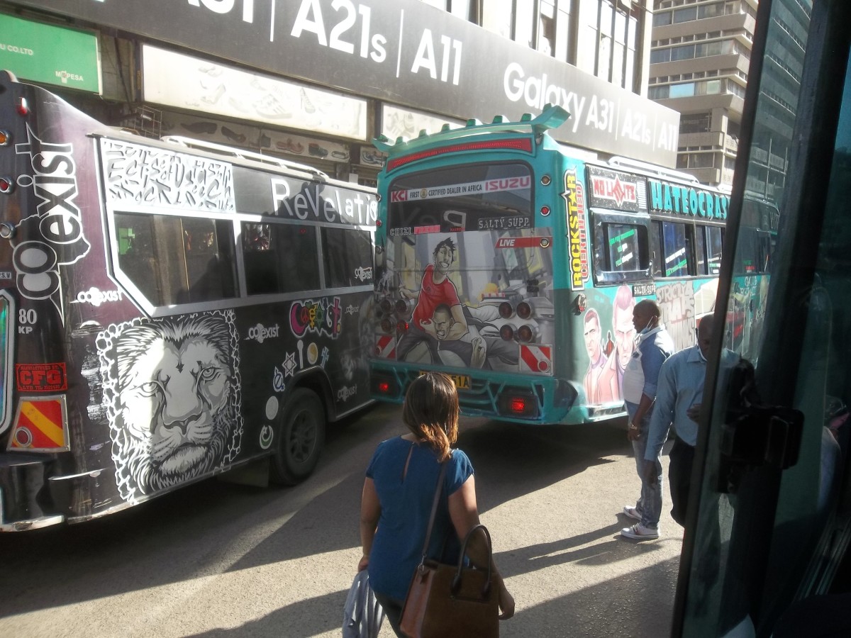 Two Matatu photographed from another Matatu Two Matatu photographed from another Matatu
