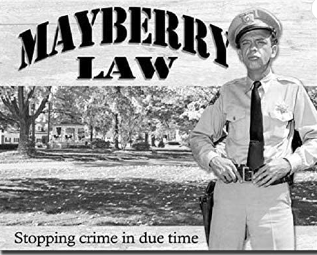 Deputy Barney Fife in front of Mayberry image.