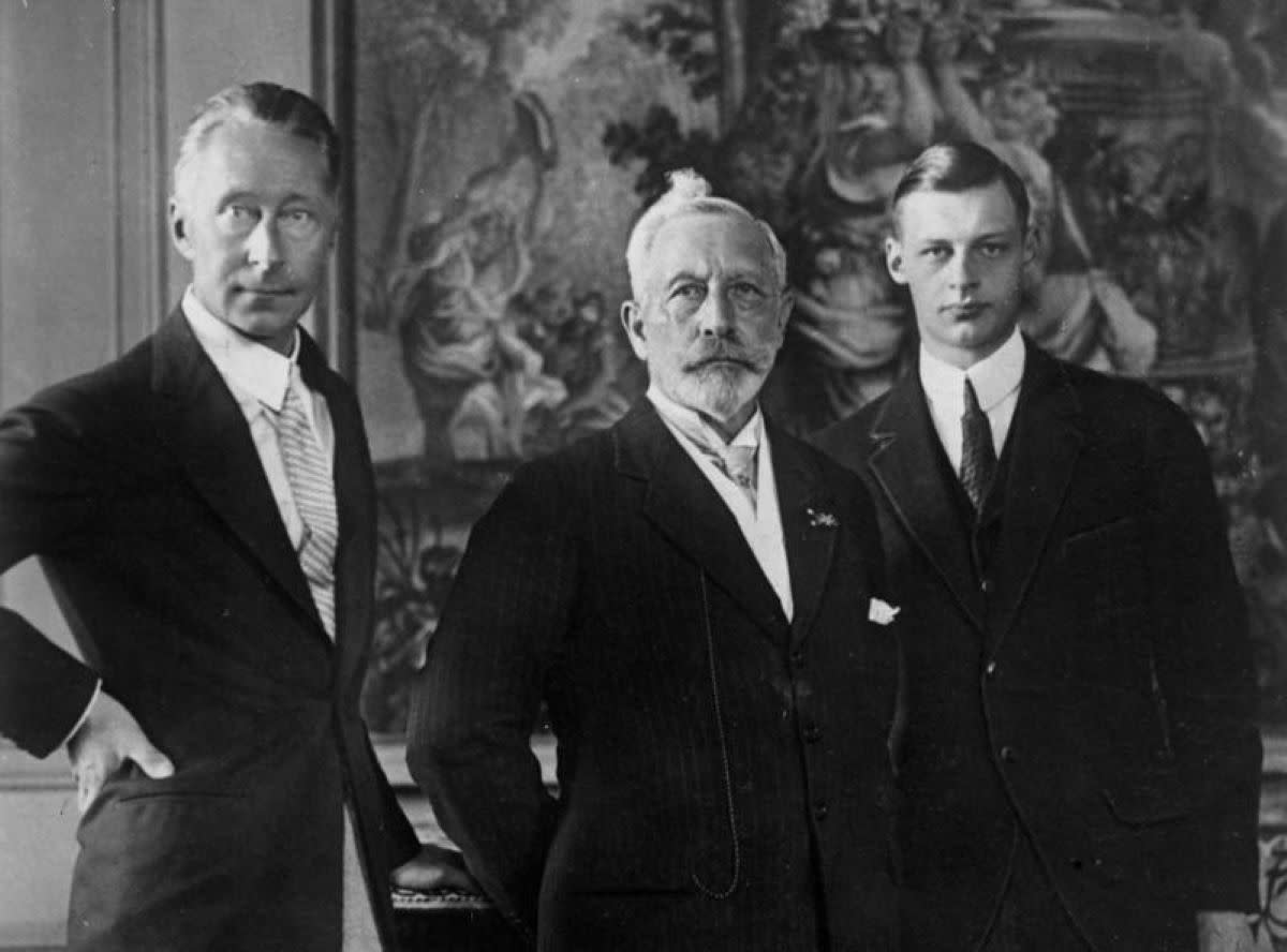 Kaiser Wilhelm II stands between Crown Prince Wilhelm "Little Willie" to his left and Prince Wilhelm (grandson) to his right. 