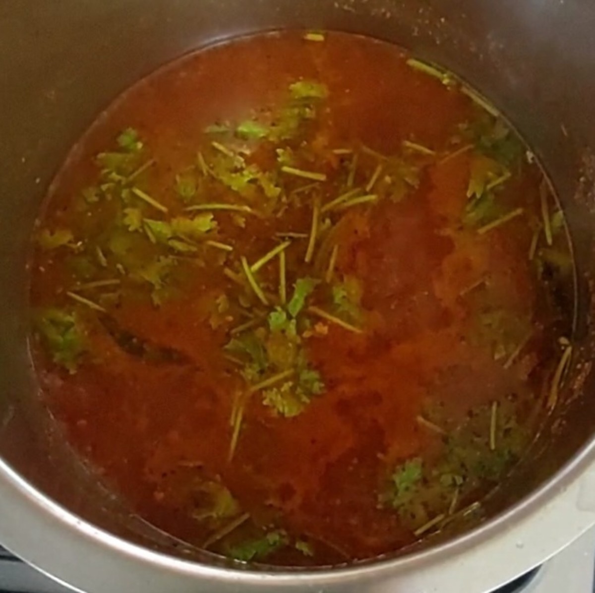 Add 1-2 sprigs chopped coriander leaves and mix well. Let it comes to a boil and then switch off the flame.
