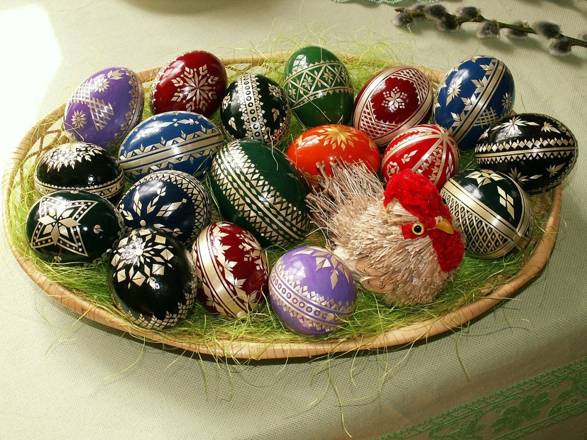 Easter eggs are a beautiful art project, but what do they have to do with Christ's death and Resurrection? The image above depicts a bowl of painted Easter eggs. One is decorated with straw, a tradition of the Haná region of the Czech Republic.