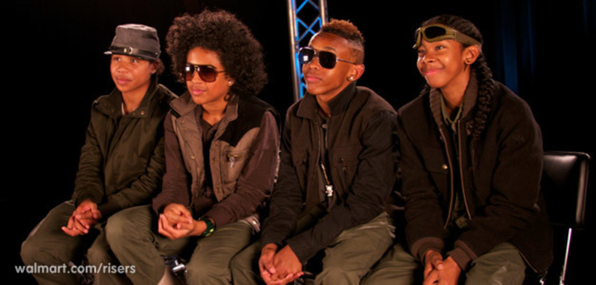 Mindless Behavior's original four members in 2011 at an event for Walmart.