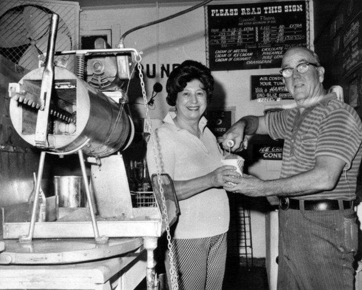 Ernest and Mary Hansen and their "Sno Bliz" machine.