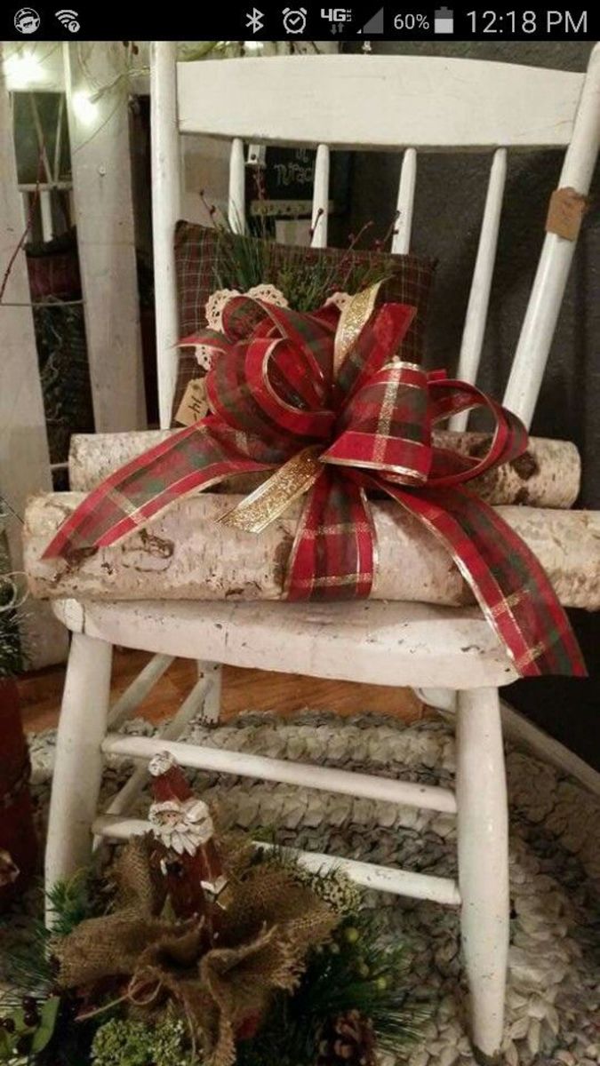 White Chair With Logs and Plaid Ribbon