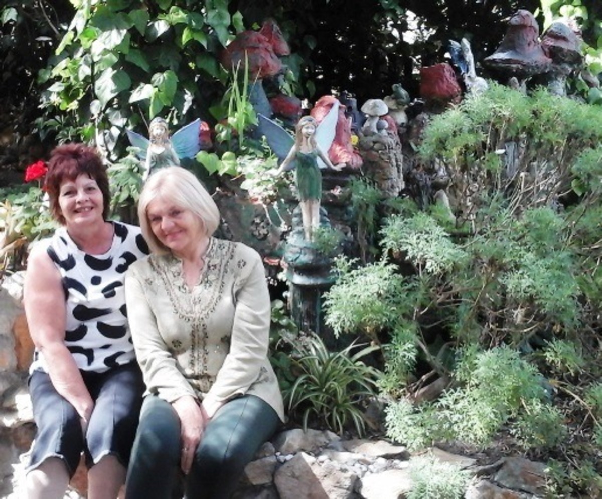 ©Martie Coetser (left) with Nadine May in her fairyland garden, Clovelly, Cape Town  