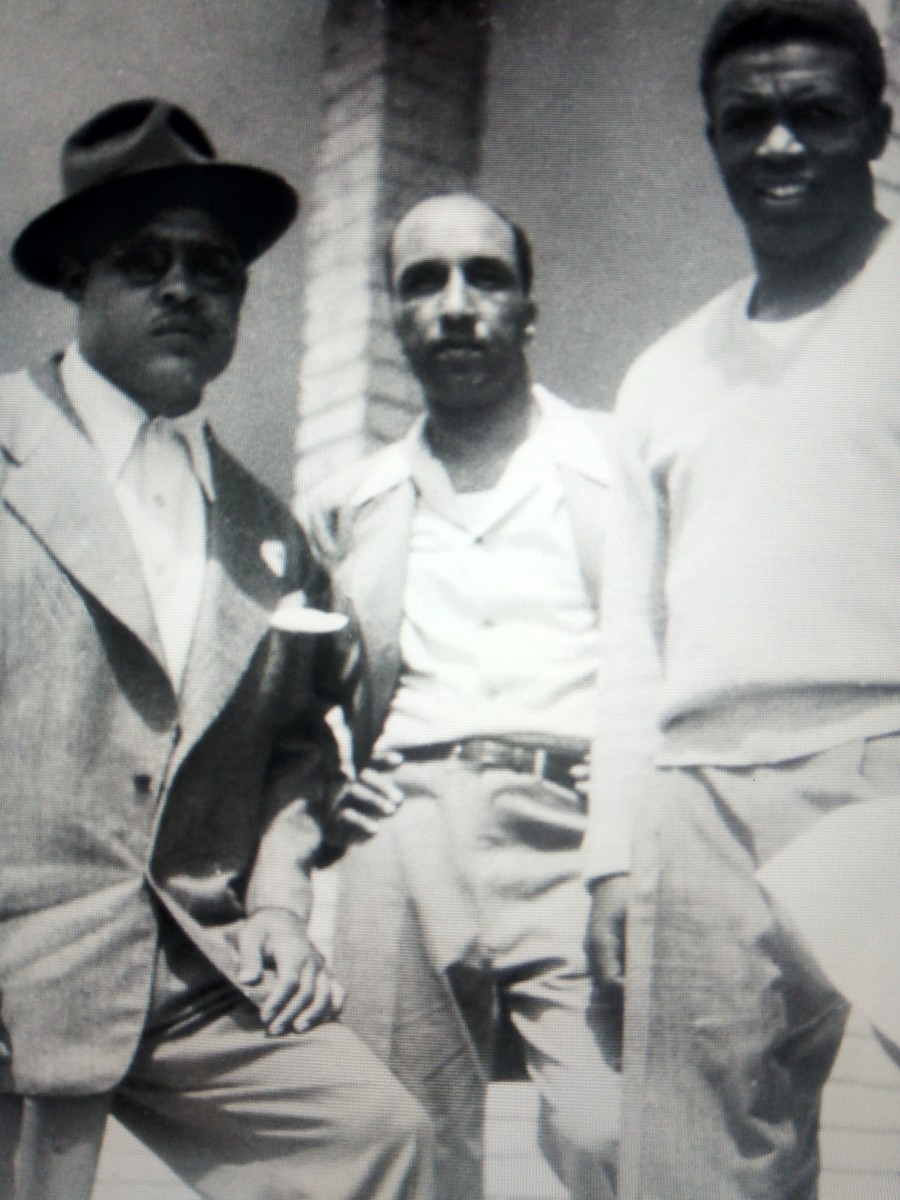 Sam (C) pictured with Joe Louis and Jackie Robinson at Jackie's Spring training in Cuba, 1947.
