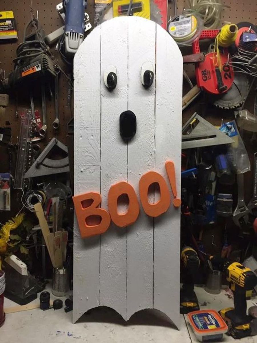 Paint a board white and add a boo sign 