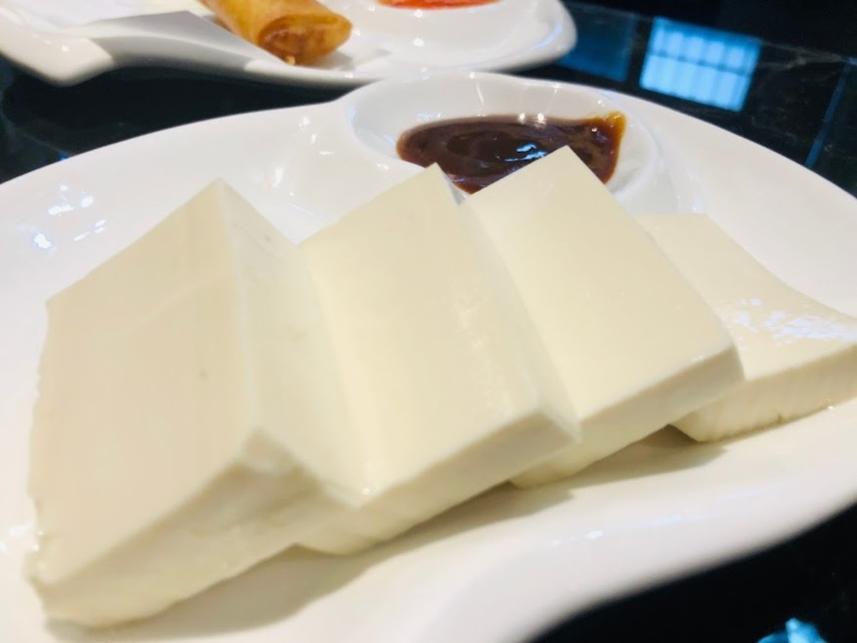 Slices of raw tofu served in a Chinese hotpot restaurant