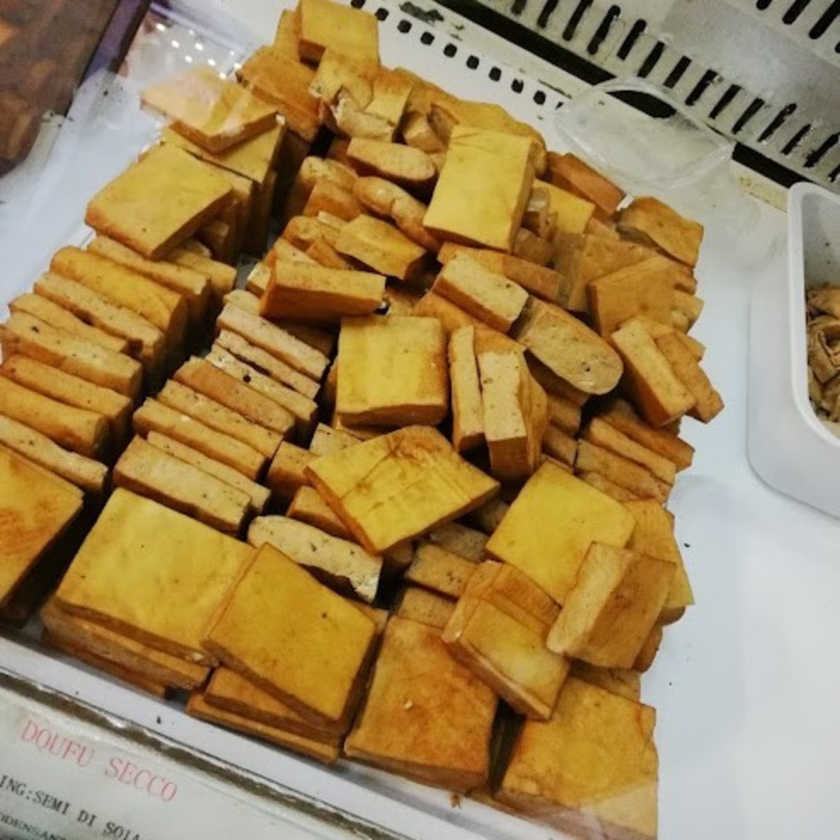 Dried tofu sold in a shop specialized in Chinese shop specialized in artisanal soy-based food
