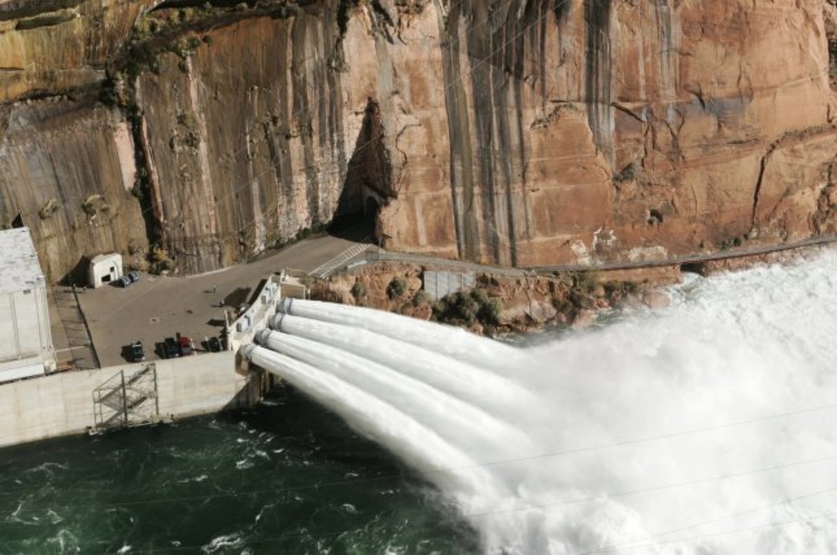 Lake Powell's hydroelectric generating outlet shows the power of using dammed water to generate electricity.