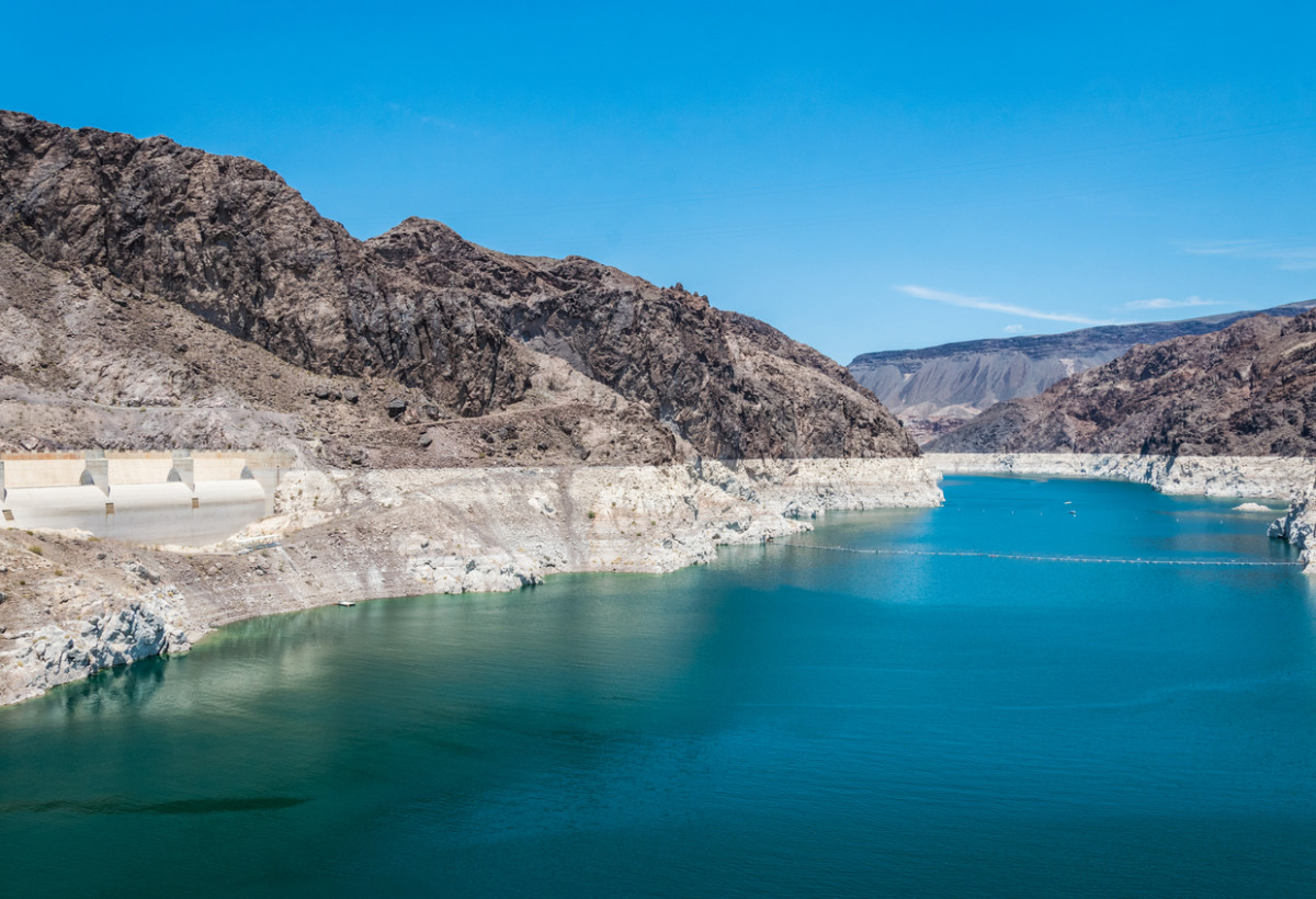 Lake Mead in severe drought with high water line showing.