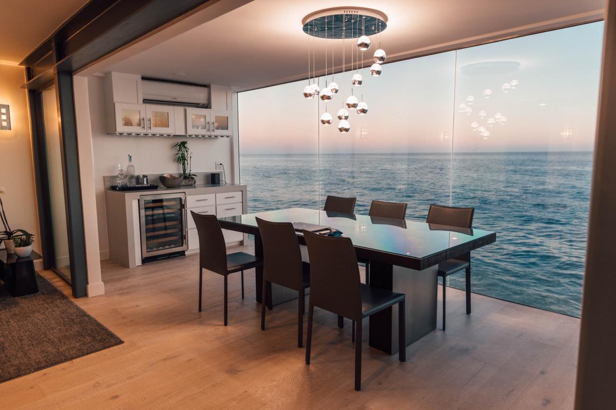 Okay, so not all of us can afford an ocean view, but could there be a more Pisces dining room than this? The chandelier of pearl-orbs screams Pisces to me.