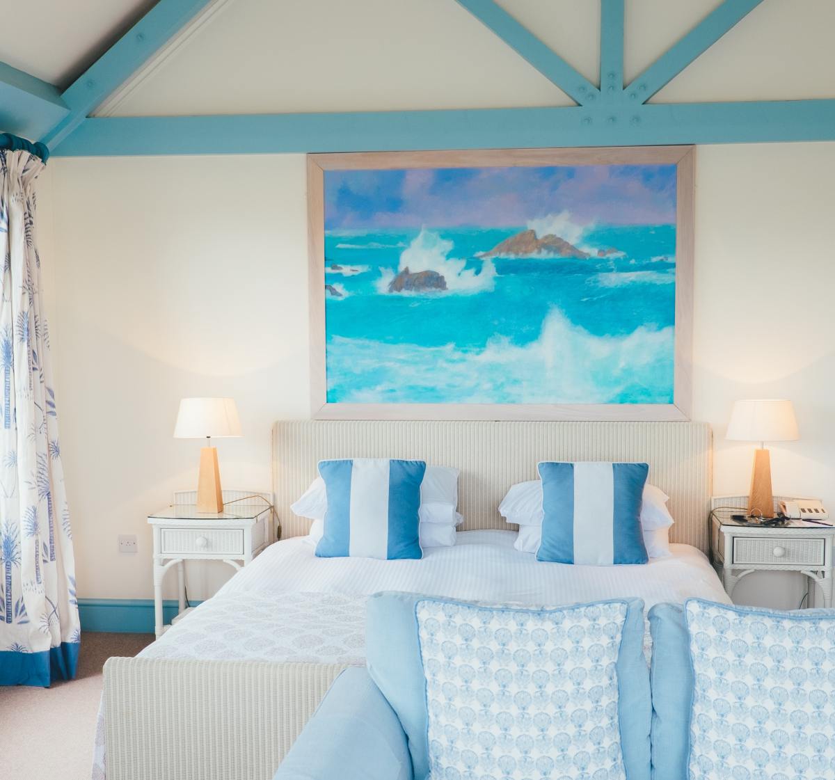 A bedroom with coastal themes is perfect for someone with a Pisces sun sign. Blue and white are an excellent combo for bedrooms because the colors are calming and clean.