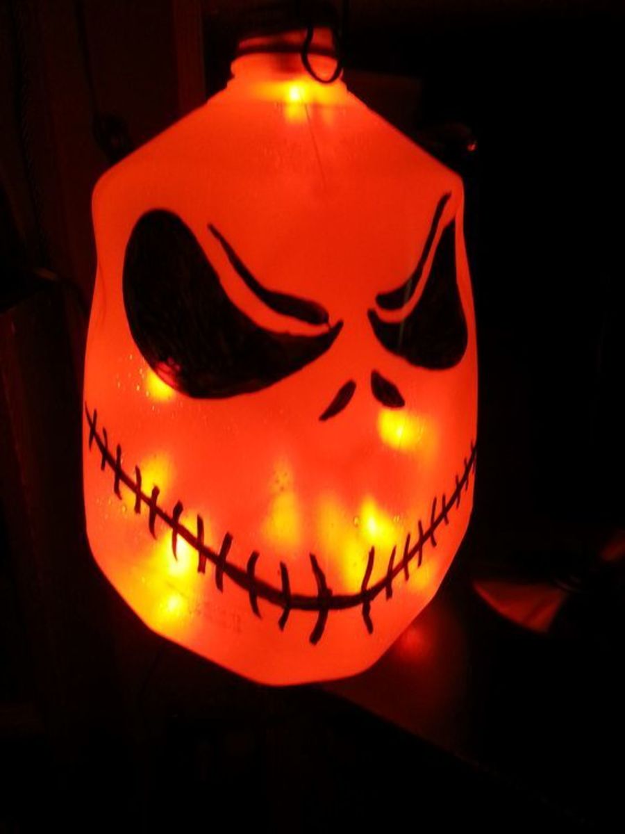 MILK JUG or any container Black sharpie marker and white paint pen. Halloween lights $1 (EVERYTHINGS a $1) or $3.99- $4.99 at Walmart. (Plug or battery operated)(Flasher bulbs optional) Just choose your face. This is Jack